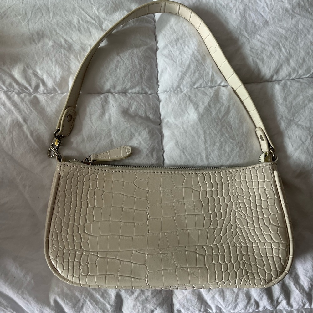 Cream over the shoulder purse